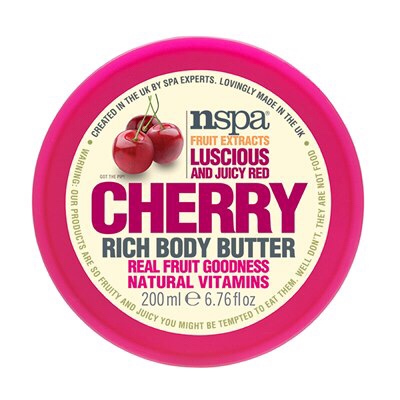 A wide spherical red plastic tub with a white label that has NSPA written in bold black writing, Cherry Rich Body Butter written in bold red writing, and a picture of a Cherry on it, on a white background.