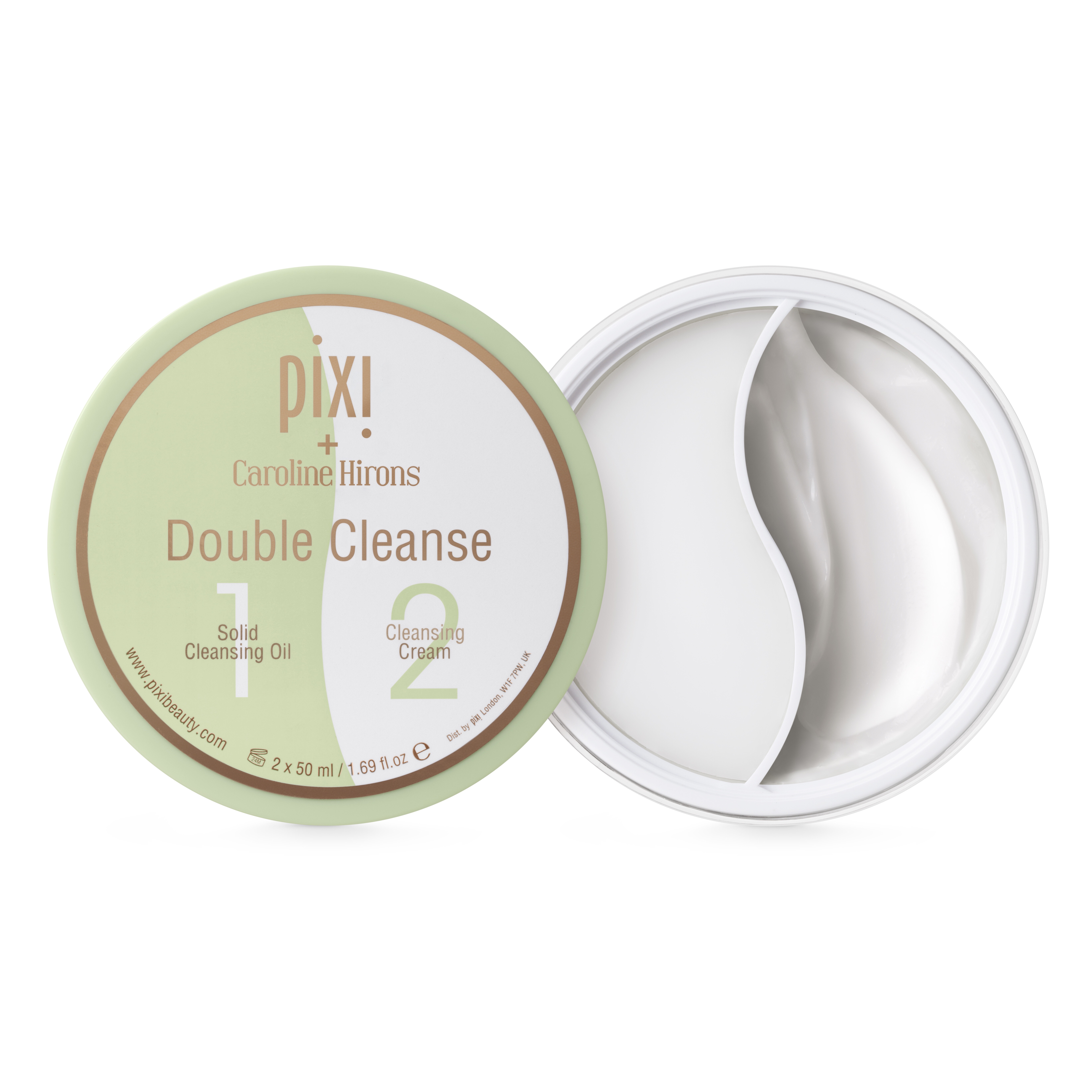 A white cylindrical plastic tub full of some white solid oil and some white cream next to a white and green plastic lid that has 1 written in white bold writing, 2 written in bold green writing, and solid cleansing oil and luxe cleansing cream written in gold writing on it, on a white background.