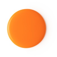 A large circular blob of dark Orange liquid, on a white background.