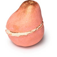 A golden orange Pear shaped Bath Bomb with a dark brown stem and a cut in the middle of it that's filled with some bright white cocoa butter, on a white background.