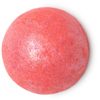 A large circular bright red block of powder that has a dark brown outline around it, on a white background.