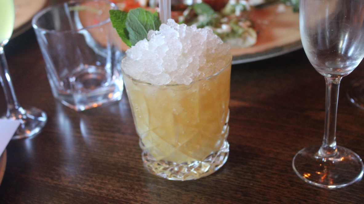 Banging The Plates | Banyan Bar and Kitchen Leeds A Rum & Raisin Mai Tai cocktail in a glass.