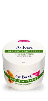 A white plastic tub with an Apricot design and a St Ives Invigorating Apricot Body Scrub label.