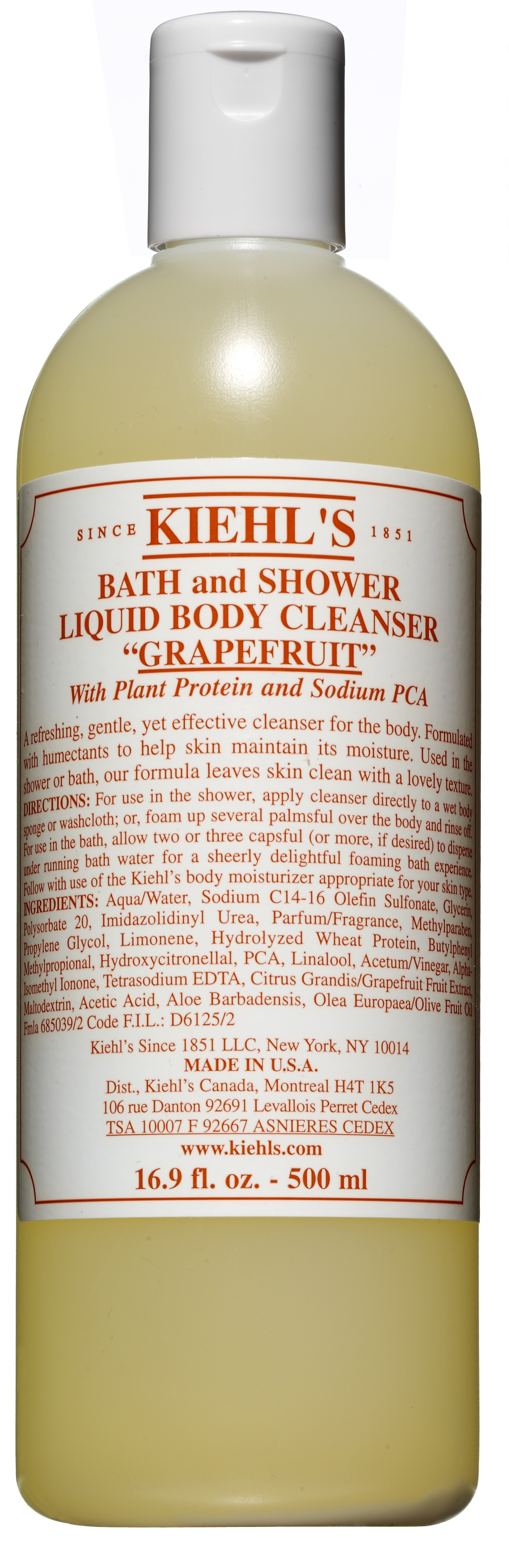 A clear bottle, with a white lid and label saying Kiehls Grapefruit Bath and Shower Liquid Body Cleanser, on a white background.