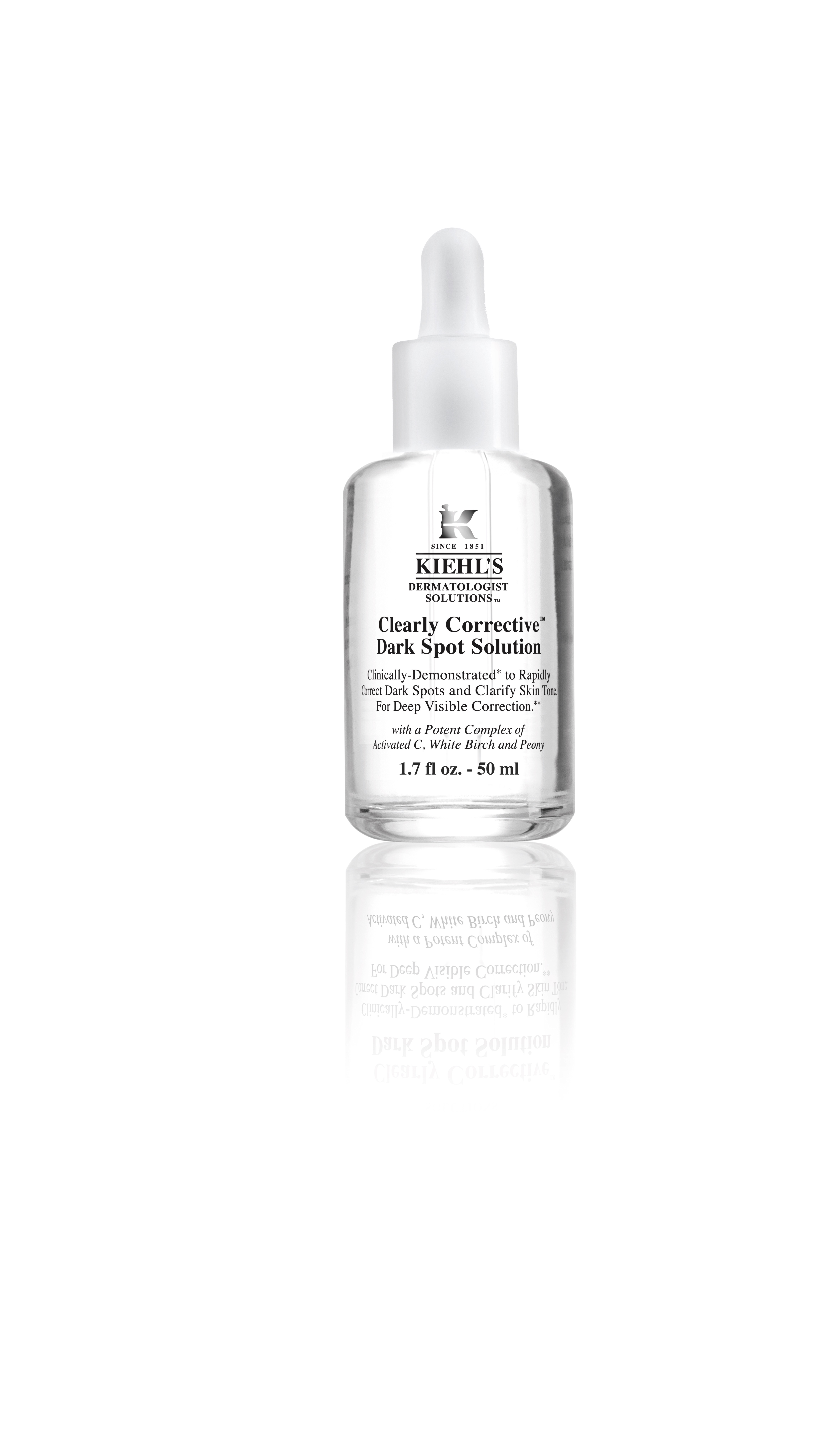 A clear glass bottle with a white pipette, and a white label saying Kiels Clearly Corrective Dark Spot Solution, on a white background.