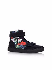 A black shoe with a floral pattern and black sole, on a white background.