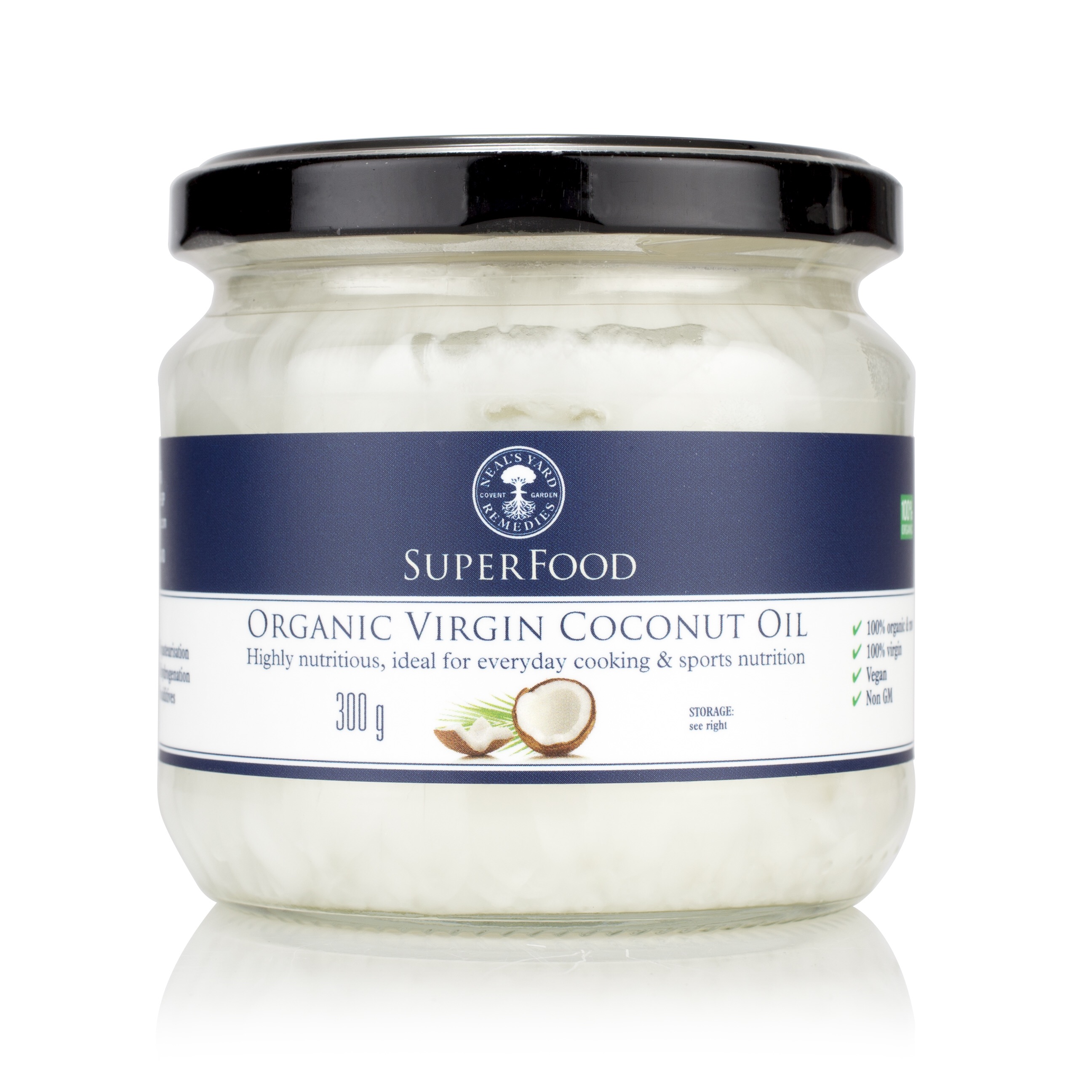 A clear glass tub full of Coconut Oil, with a blue label, and a black lid.