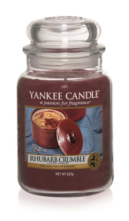 Tea Tastes Terrific | Whittard of Chelsea Apple Crumble Loose Leafed Tea A tall glass jar full of dark red wax, with a label with a picture of a freshly baked Rhubarb Crumble on the jar, on a white background.