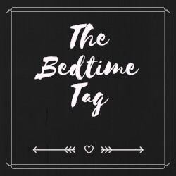 A heart, in between two arrows, below the bedtime tag written in white cursive writing, on a black background.