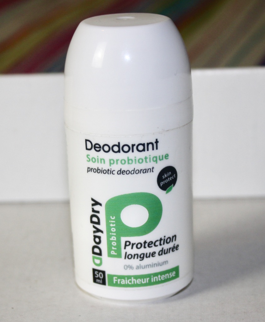 A Very Dry Day | DayDry Deodorant Intense Freshness Roll On Deodorant A white roll-on deodorant bottle with DayDry Deodorant and protect written in black writing, with a green letter P next to it, on a white background.