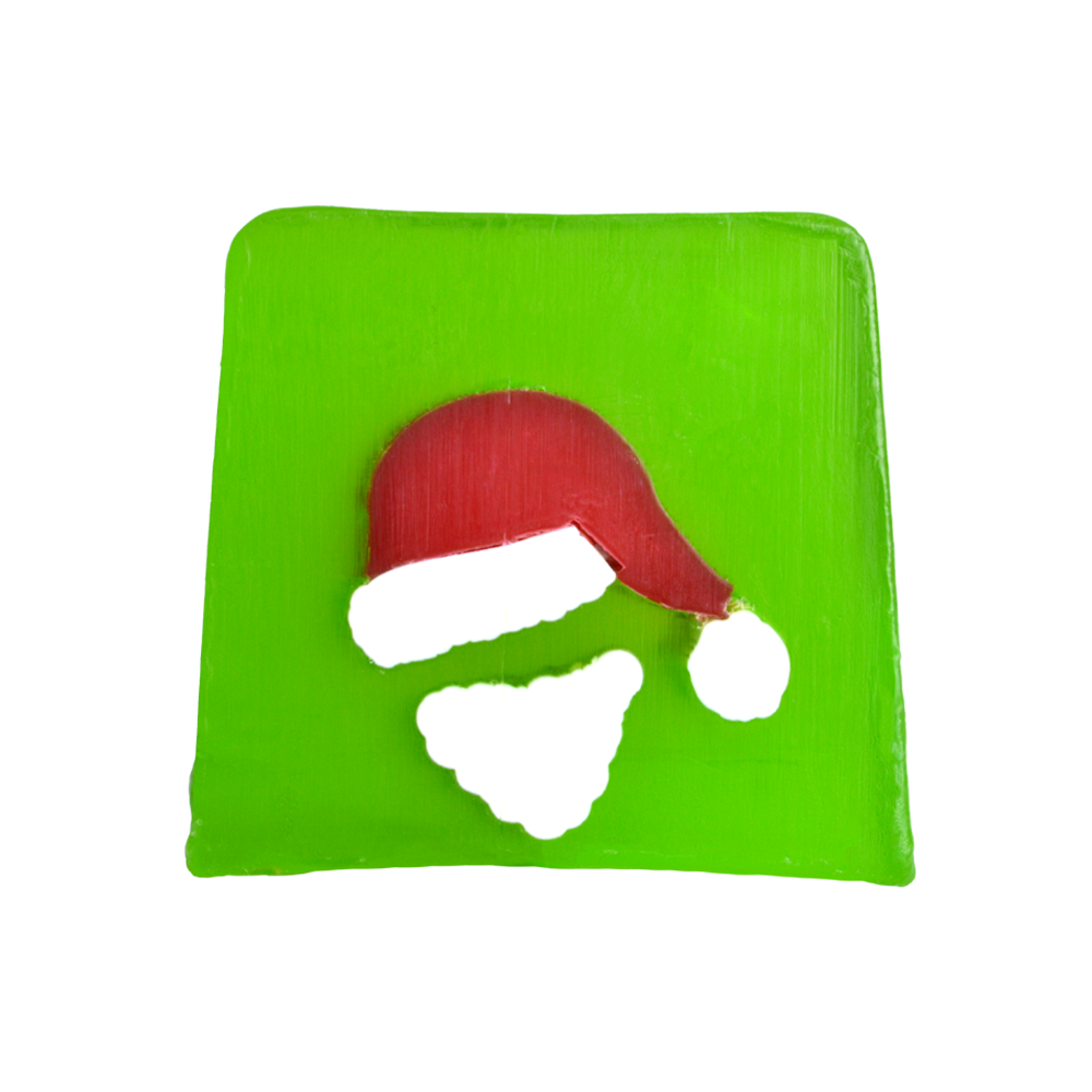A Yummy Smelling Yorkshire Christmas | The Yorkshire Soap Company Christmas 2018 Range A large square block of bright green soap that has a picture of a Santa wearing a Santa's Hat engraved into it, on a white background.