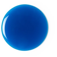 A large circular puddle of dark blue liquid, on a white background.