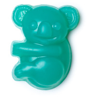 A small bright blue-green koala shaped block of soap, on a white background.