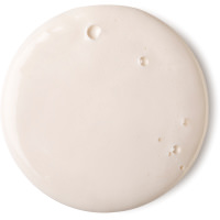 A small circular puddle of creamy white Shower Gel, on a white background.