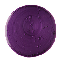 A small circular puddle of vibrant purple shampoo, on a white background.