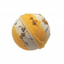 A large spherical shaped white and yellow striped bath bomb that has some pieces of Chamomile Petals embedded all over it, on a white background.