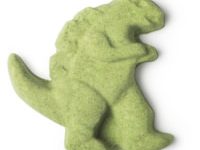 A small bright green Tyrannosaurus Rex shaped Bath Bomb, on a white background.