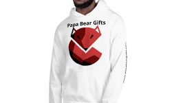 A tall black man wearing a bright white hoodie that has Papa Bear Gifts written in bold black writing and an abstract drawing of a Red Fox on it, on a white background.