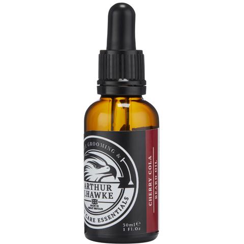 It Was Good Til The Last Drop | Arthur J Hawke Cherry Cola Beard Oil A short cylindrical dark green glass bottle with a black rubber pipette lid and a black label that has Arthur J Hawke Cherry Cola Beard Oil written in bold white writing on it, on a white background.