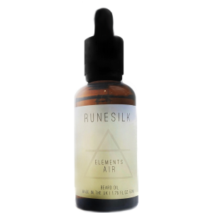 A short cylindrical brown glass bottle with a black rubber pipette lid and a white and gradient light blue label that has runesilk elements Air beard oil written in bold black writing and a picture of a light blue triangle on it, on a white background.