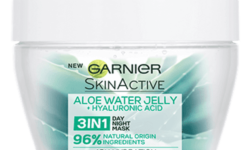 A wide short cylindrical white plastic tub that has Garnier Naturals written in bold black writing, Aloe Extract 3-In-1 Hydrating Aloe Water Jelly written in bold green writing, and a picture of a dark green aloe vera plant on it, on a white background.