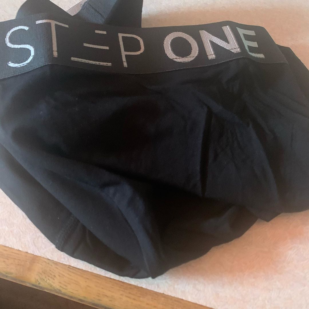 I Finally Got Some | Step One Blackcurrant Trunks A large pair of black trunks that has Step One written in bold white writing on them, on a white background.