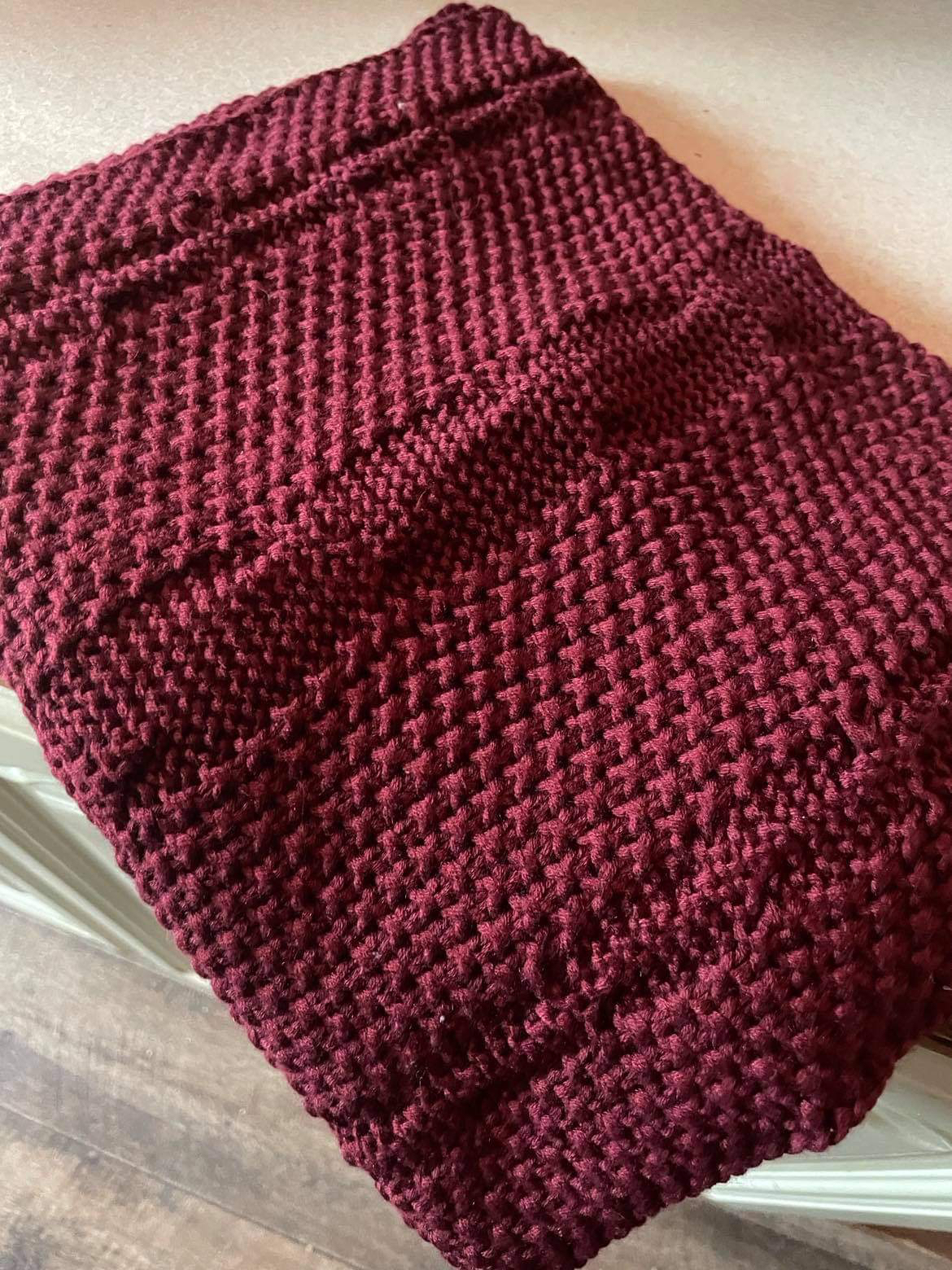 Brrr! It’s Cold In Denmark | Trendhim Fawler Freddi Wine Red Urban Scarf & Fawler Kent Wine Red Kane Beanie | Gifted A large wine red folded up knitted scarf, on a white background.
