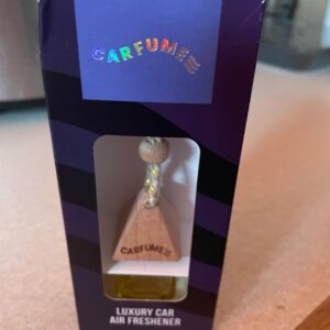 A large glass diamond shaped Car Air Freshener bottle inside a light brown cardboard box that has Carfume™ written in bold black writing on it, on a white background.