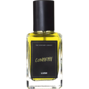 A large rectangular glass perfume bottle with a black metallic lid and a black label that has Lush Confetti Perfume written in bold silver writing on it, on a white background.