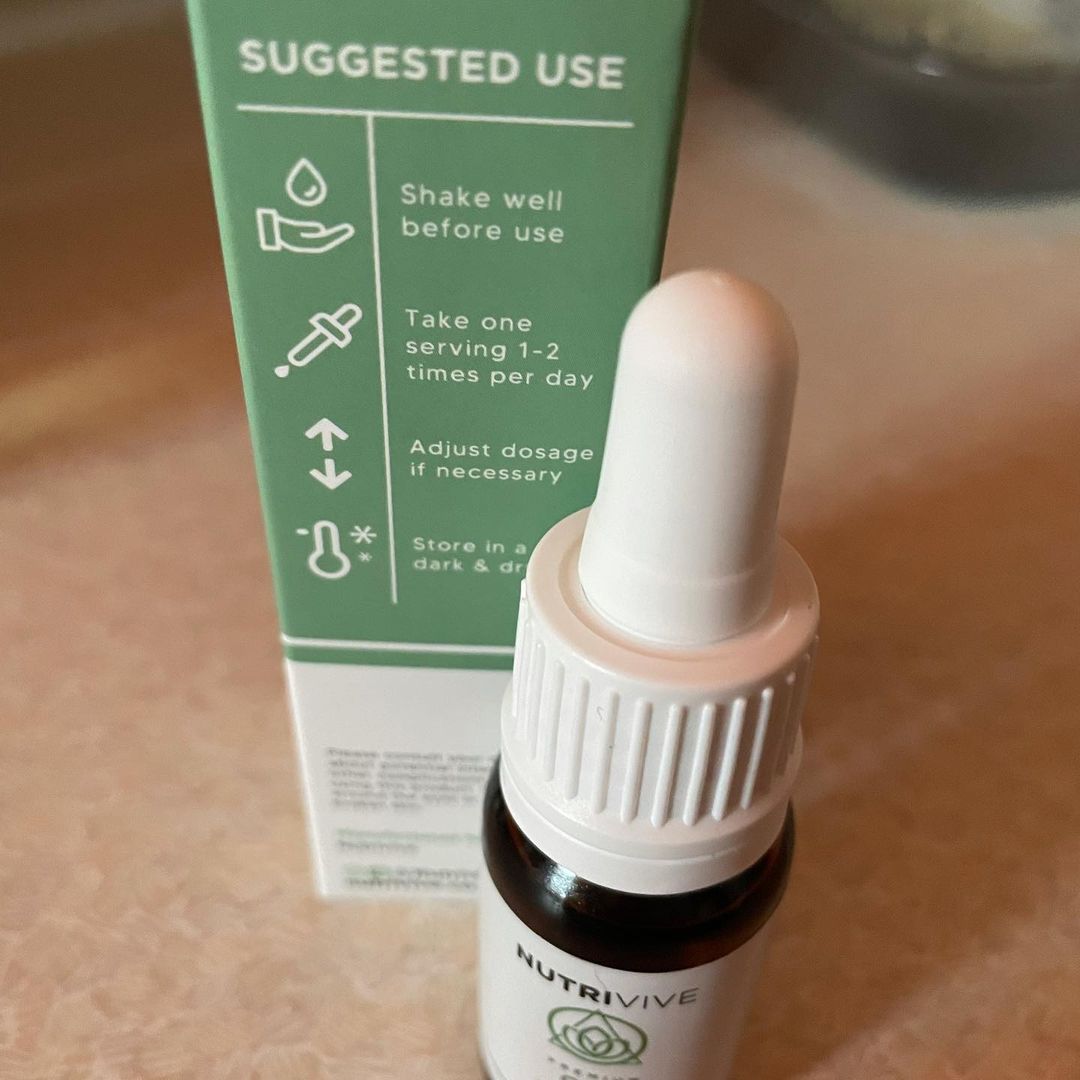 The Reviving Power Of CBD Oil | Nutrivive 500mg CBD Oil | Gifted A tall cylindrical brown glass bottle with a white rubber pipette lid and a white label that has Nutrivive 500mg CBD Oil written in bold black writing on it, on a white background.