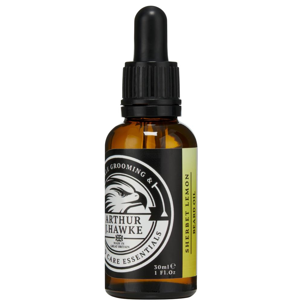 The Hawke Has Brought Me A Bag Of Sweets | Arthur J Hawke Lemon Sherbet Beard Oil A short cylindrical brown glass bottle with a black rubber pipette lid and a white label that has Arthur J Hawke Lemon Sherbet Beard Oil written in bold white writing and a picture of a black and white hawk on it, on a white background.