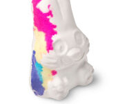 A large bright white rabbit shaped bath bomb that has some flecks of Pink, yellow, blue and purple all over it, on a white background.