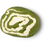 A large light green and white swirl designed oval shaped bubble bar, on a white background.