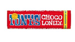 A long thin chocolate bar wrapped in a piece of red paper that has Tony’s Chocolonely Milk Chocolate Bar written in bold white writing on it, on a white background.