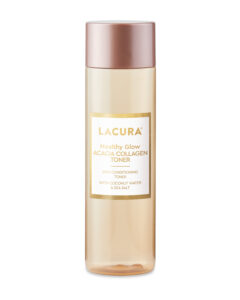 A tall cylindrical clear plastic bottle full of some translucent blue liquid with a bright gold lid that has Aldi Lacura Healthy Glow Acacia Collagen Toner written in bold gold writing on it, on a white background.
