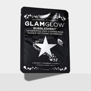 A tall rectangular black plastic pouch that has GlamGlow BubbleSheet™ Oxygenating Deep Cleanse Mask written in bold silver writing and a picture of a silver star on it, on a white background.