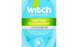 A tall rectangular light blue plastic pouch that has Witch Purifying Clearing Sheet Mask written in bold white writing and a picture of a light green stripe on it, on a white background.