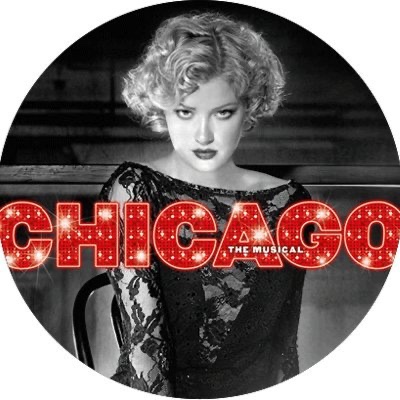 A poster of a tall blond woman wearing a long black dress that has Chicago written in bright red twinkling lights next to it, on a white background.