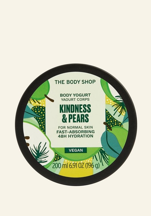 Sharing Love, Joy & Kindness This Christmas | The Body Shop Christmas 2021 Range A short rounded rectangular black plastic tub with a black plastic lid that has The Body Shop written in bold black writing, Kindness & Pears Body Yoghurt written in bold dark green writing, and some pictures of some large bright green pears on it, on a white background.
