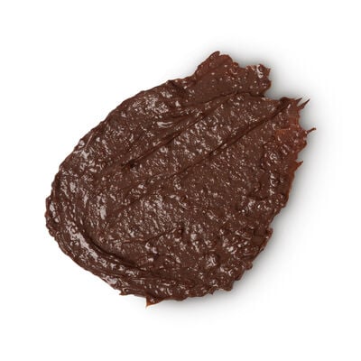 Melting A Chocolate Orange All Over My Body | Lush Posh Chocolate Body Wash & Sweet Wild Orange Hand Balm A medium circular puddle of dark brown body wash, on a white background.