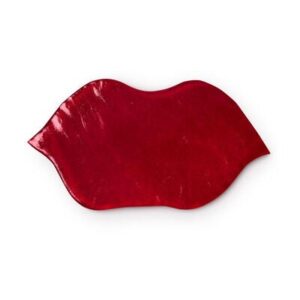A large bright red lips shaped block of jelly, on a white background.