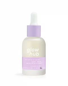 A tall cylindrical white glass bottle with a white rubber pipette lid and a pale lilac label that has Glow Hub Purify & Brighten Super Serum written in bold white writing on it, on a white background.