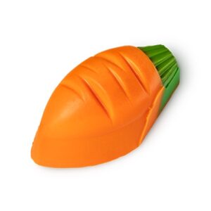 A small bright orange carrot shaped block of soap that has some green leaves coming out of the top of it, on a white background.