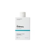 A tall rectangular white plastic bottle with a white plastic lid that has The Ordinary Behentrimonium Chloride 2% Conditioner written in bold black writing and a picture of a dark blue stripe on it, on a white background.