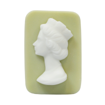 Celebrating The Queen's 70th Jubilee In Yorkshire | The Yorkshire Soap Company 70th Jubilee Range A large rectangular pale blue block of soap that has a picture of a bright white woman wearing a crown engraved on it, on a white background.