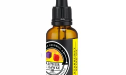 A short cylindrical brown glass bottle with a black rubber pipette lid and a white label that has Arthur J Hawke Starburst Beard Oil written in bold white writing and a picture of a black and white hawk on it, on a white background.