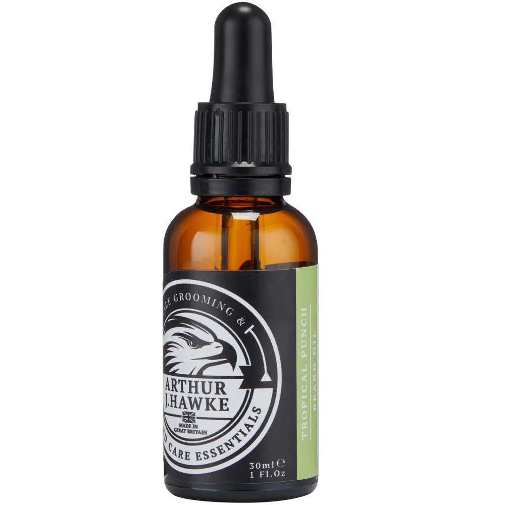 I'm Taking My Beard On A Tropical Vacation | Arthur J Hawke Tropical Punch Beard Oil A short cylindrical brown glass bottle with a black rubber pipette lid and a white label that has Arthur J Hawke Tropical Punch Beard Oil written in bold white writing and a picture of a black and white hawk on it, on a white background.