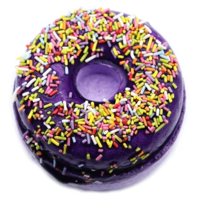 Mmm... Doughnuts! | H&L Bath Bombs Donut Bath Bomb range A large circular dark purple doughnut shaped bath bomb that has some various different coloured sprinkles embedded on top of it, , on a white background.