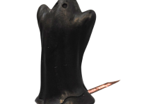 A large dark black ghost shaped block of soap, on a white background.