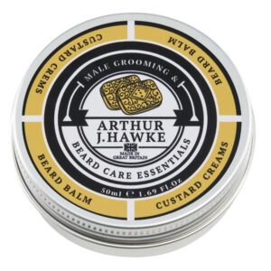 A short cylindrical white metallic tin with a gradient black and white metallic lid and a white label that has Arthur J Hawke Custard Creams Beard Balm written in bold black writing and a picture of a black hawk on it, on a white background.